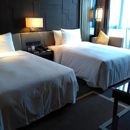 Wanda Realm Hotel Дуньин Стая снимка