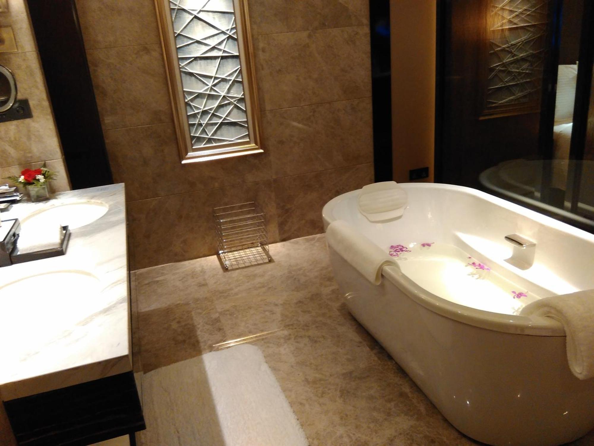 Wanda Realm Hotel Дуньин Стая снимка