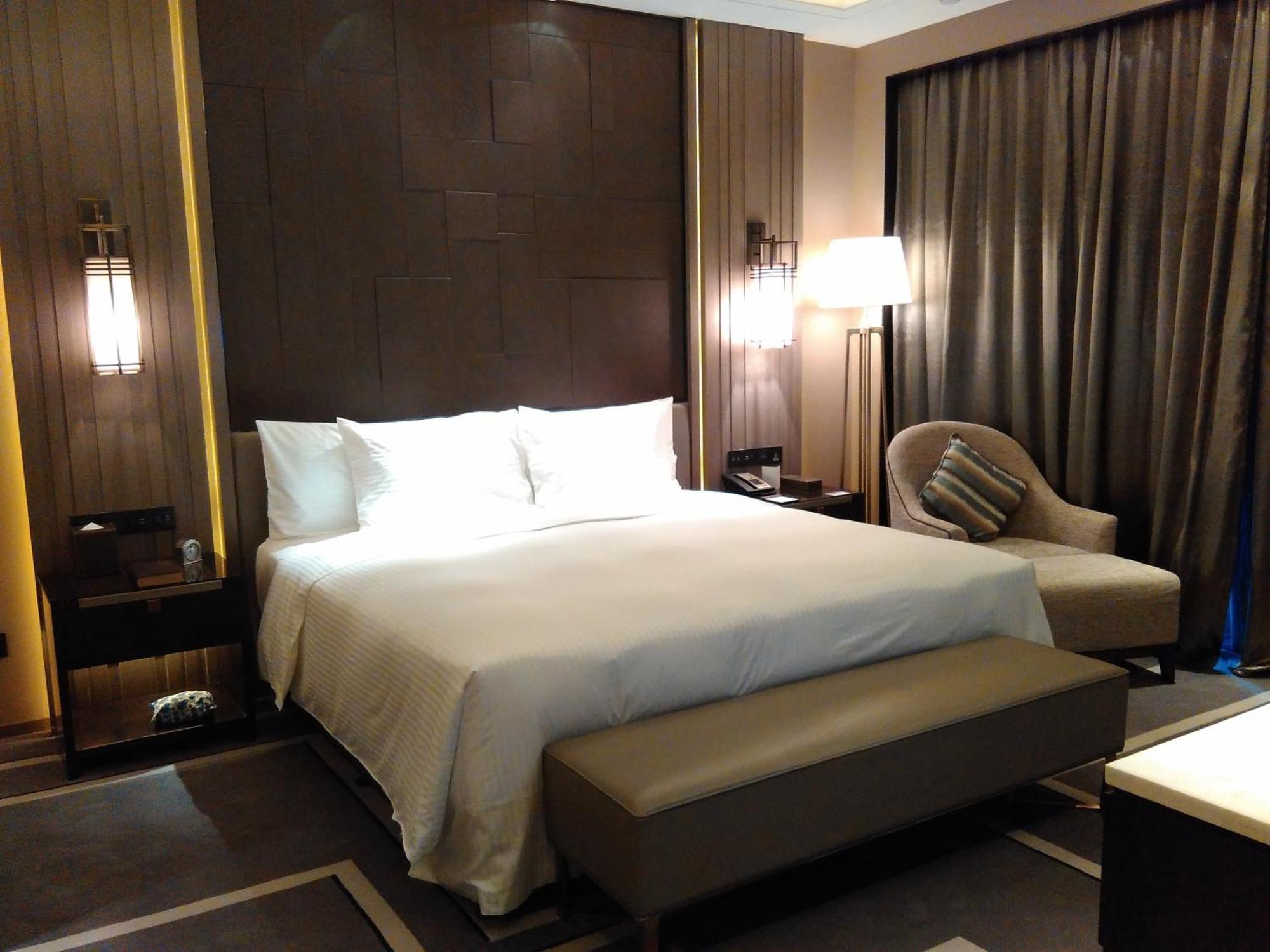 Wanda Realm Hotel Дуньин Стая снимка
