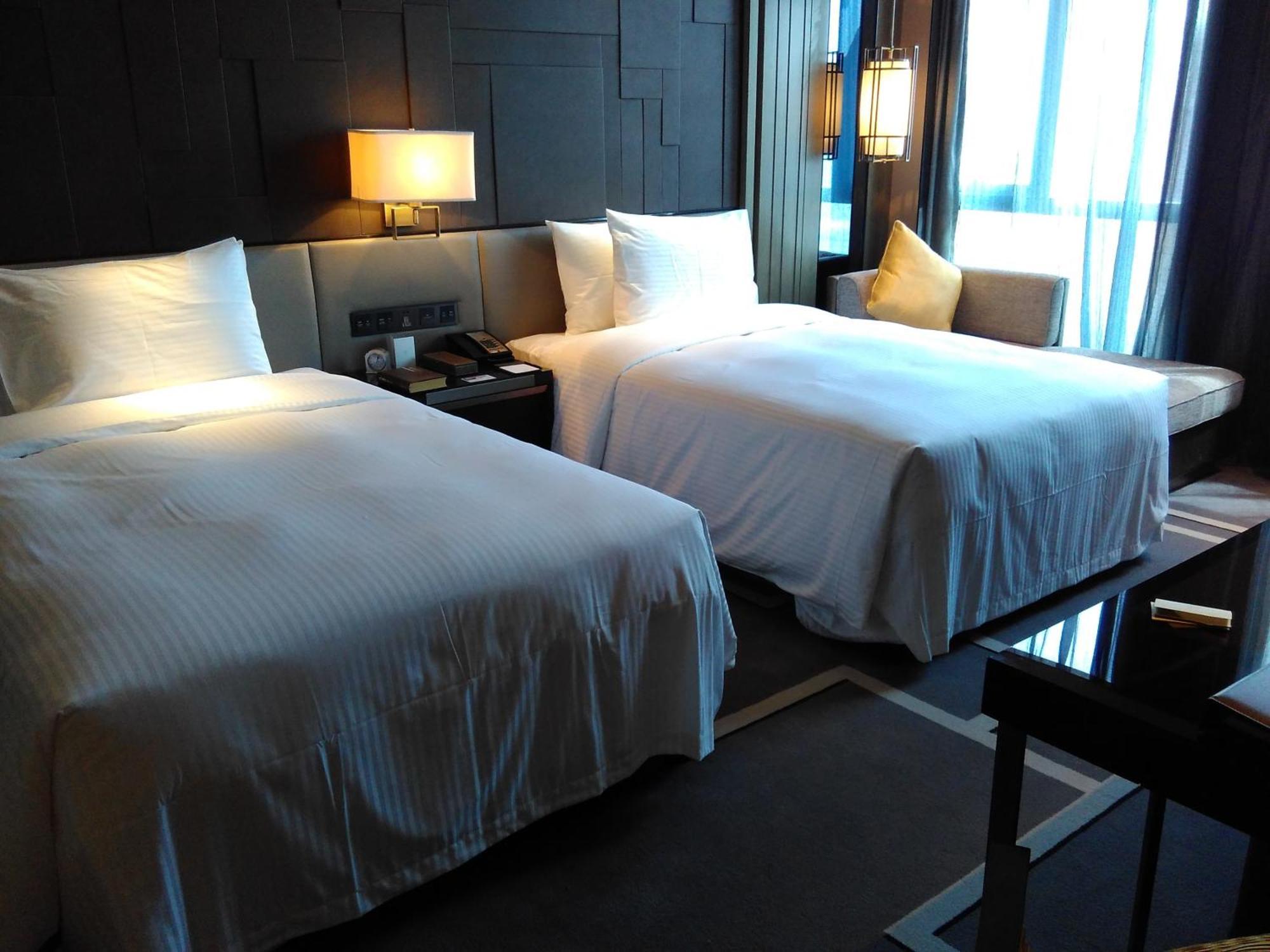 Wanda Realm Hotel Дуньин Стая снимка