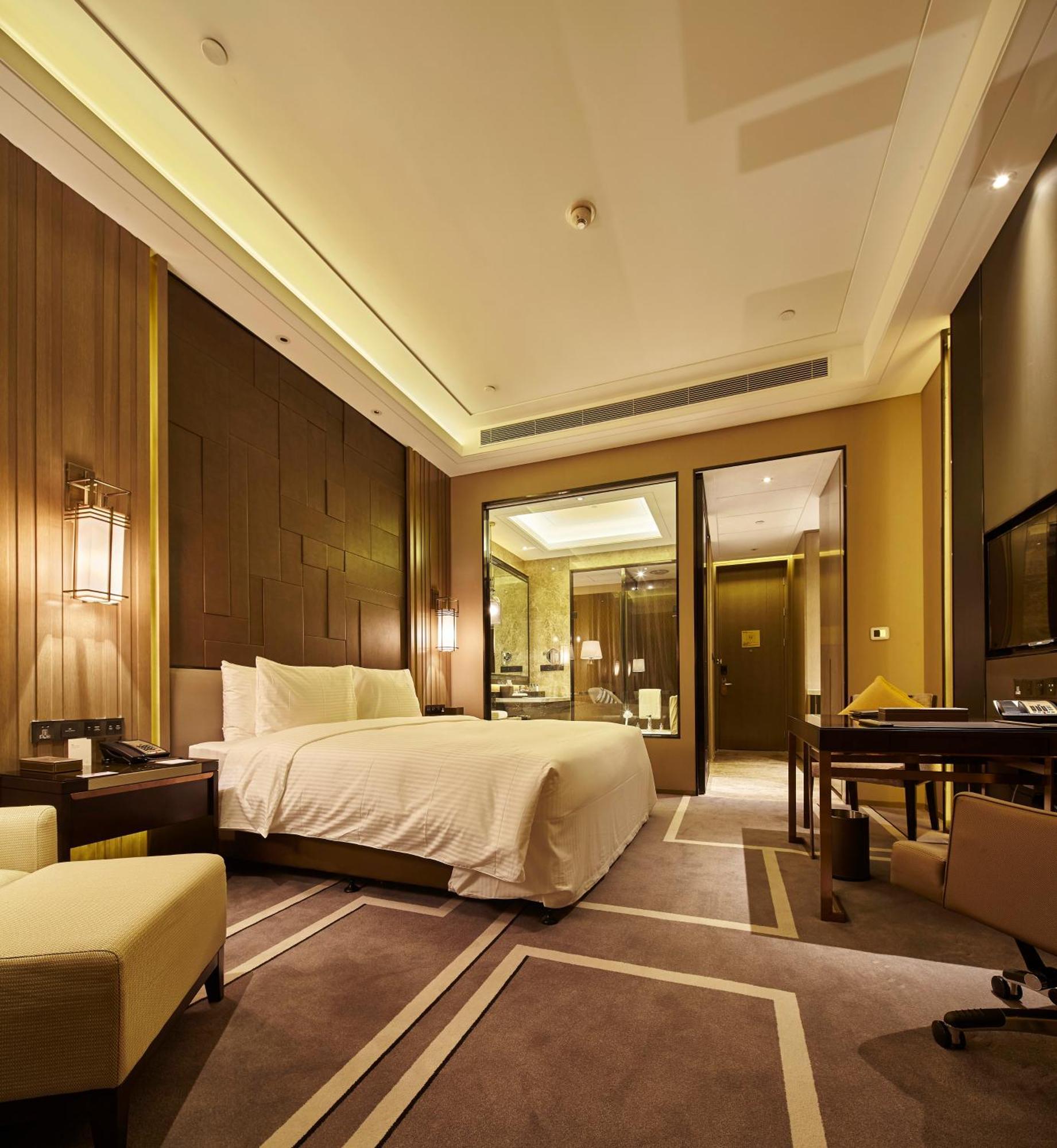 Wanda Realm Hotel Дуньин Стая снимка