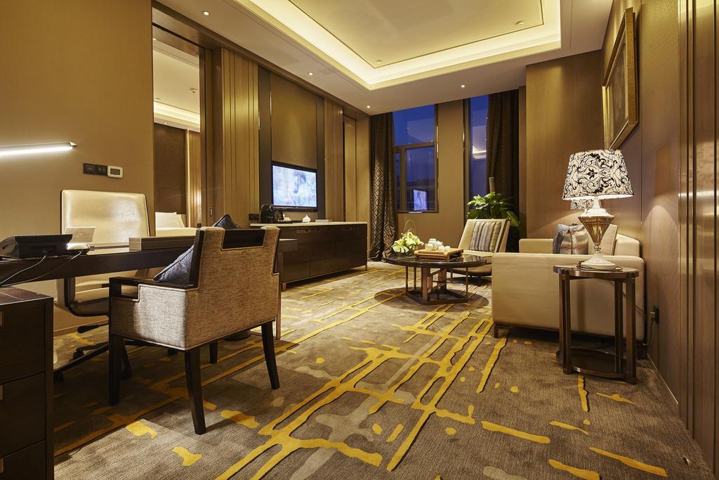 Wanda Realm Hotel Дуньин Стая снимка