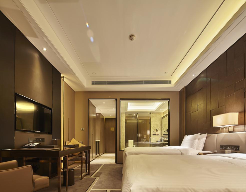 Wanda Realm Hotel Дуньин Стая снимка