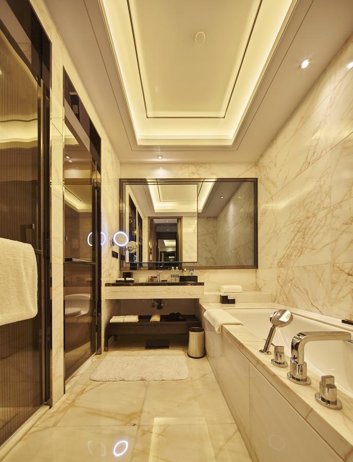 Wanda Realm Hotel Дуньин Стая снимка